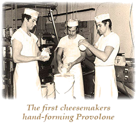 The first cheesemakers hand-forming Provolone